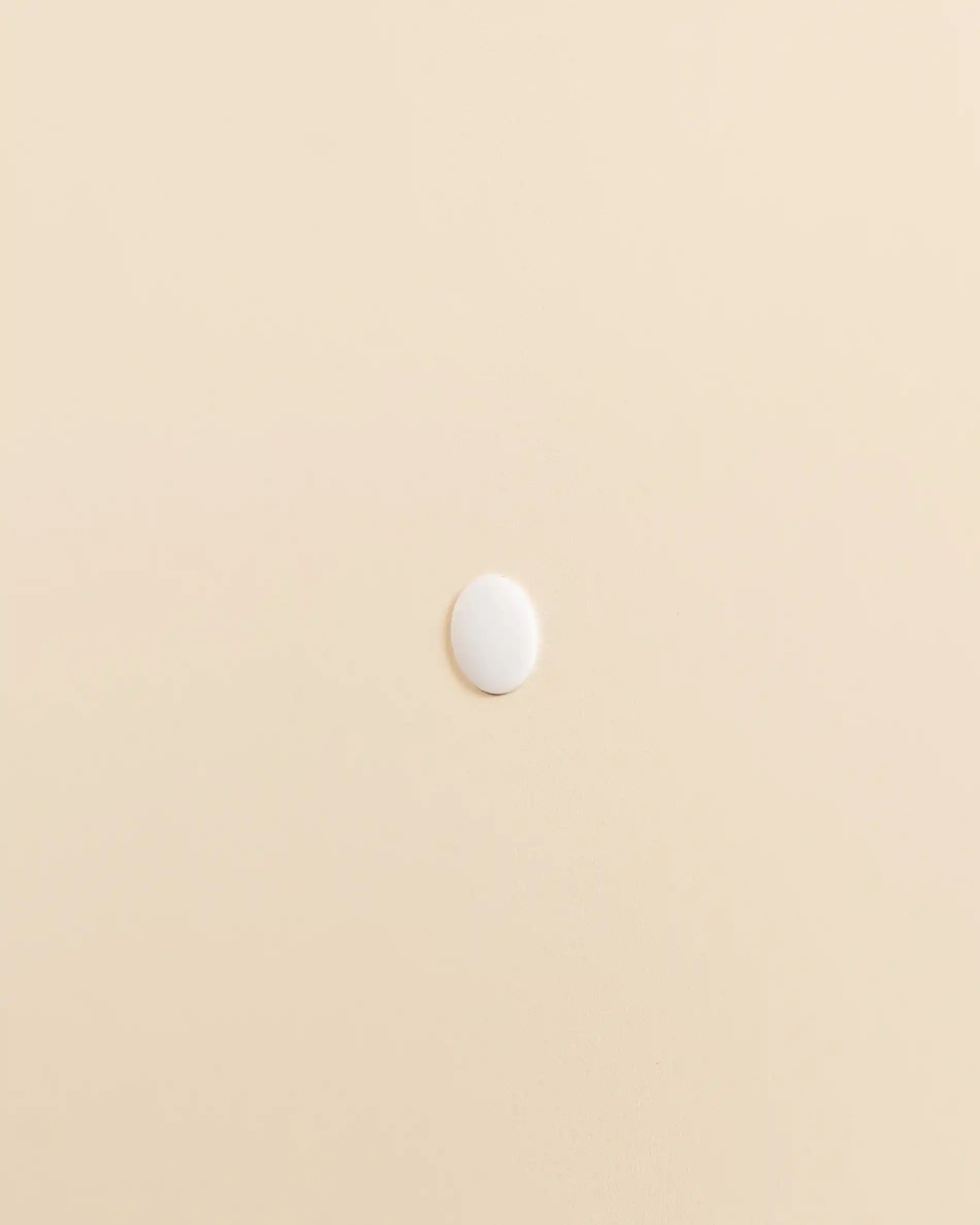 Copri-vite beige crema PILOTIS, vista laterale