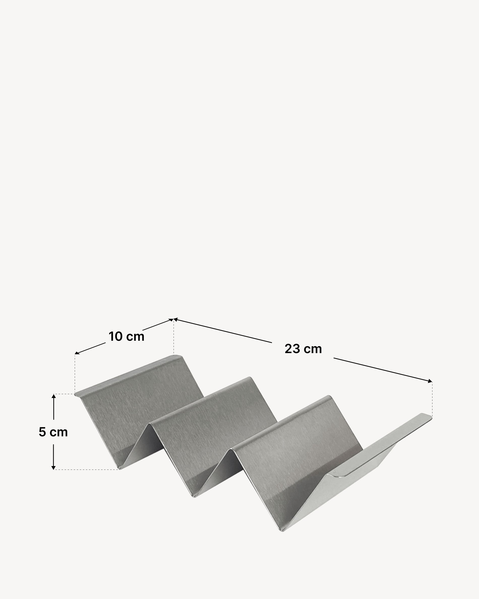 Supporto per tacos in acciaio inox con struttura piegata a zigzag, dotato di più alloggiamenti per tortillas, presentato con uno schema delle dimensioni che indica una lunghezza totale di 23 cm, una larghezza di 10 cm e un’altezza di 5 cm.